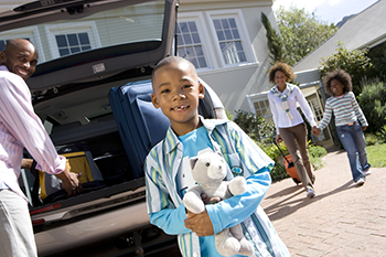 Family preparing for car trip